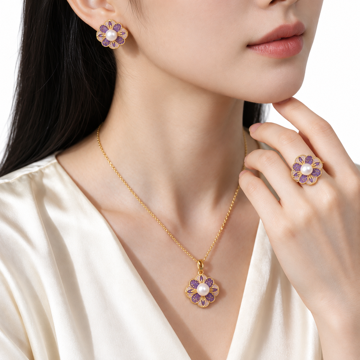 Model wearing the purple enamel flower necklace, stud earring and ring