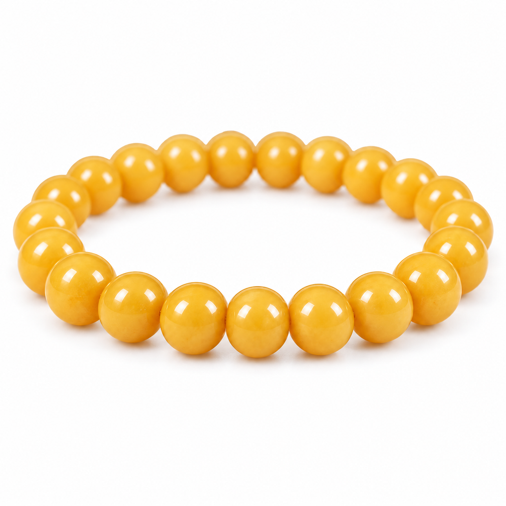 Macro detail of the butter-yellow amber beads showing their natural depth and polish