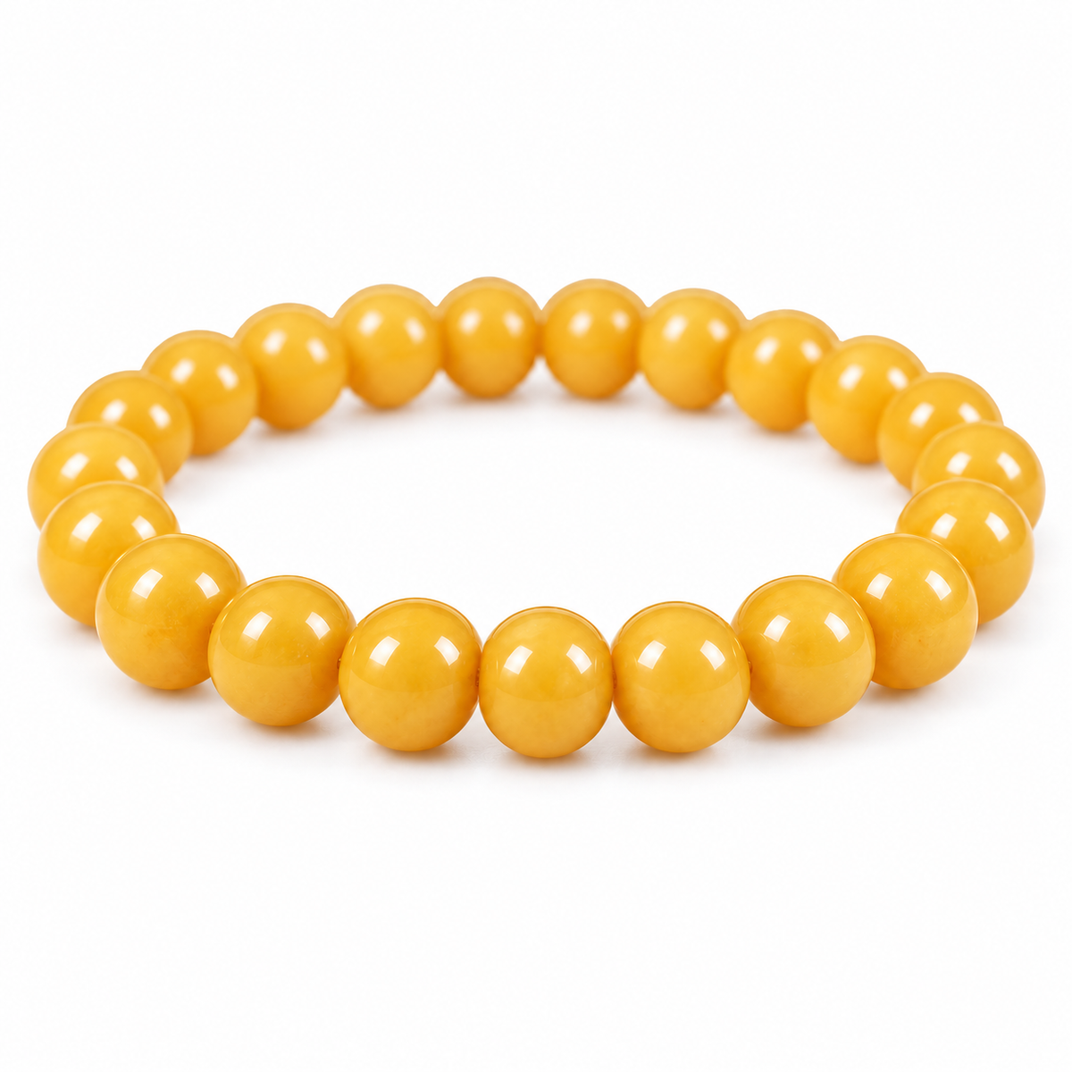 Macro detail of the butter-yellow amber beads showing their natural depth and polish