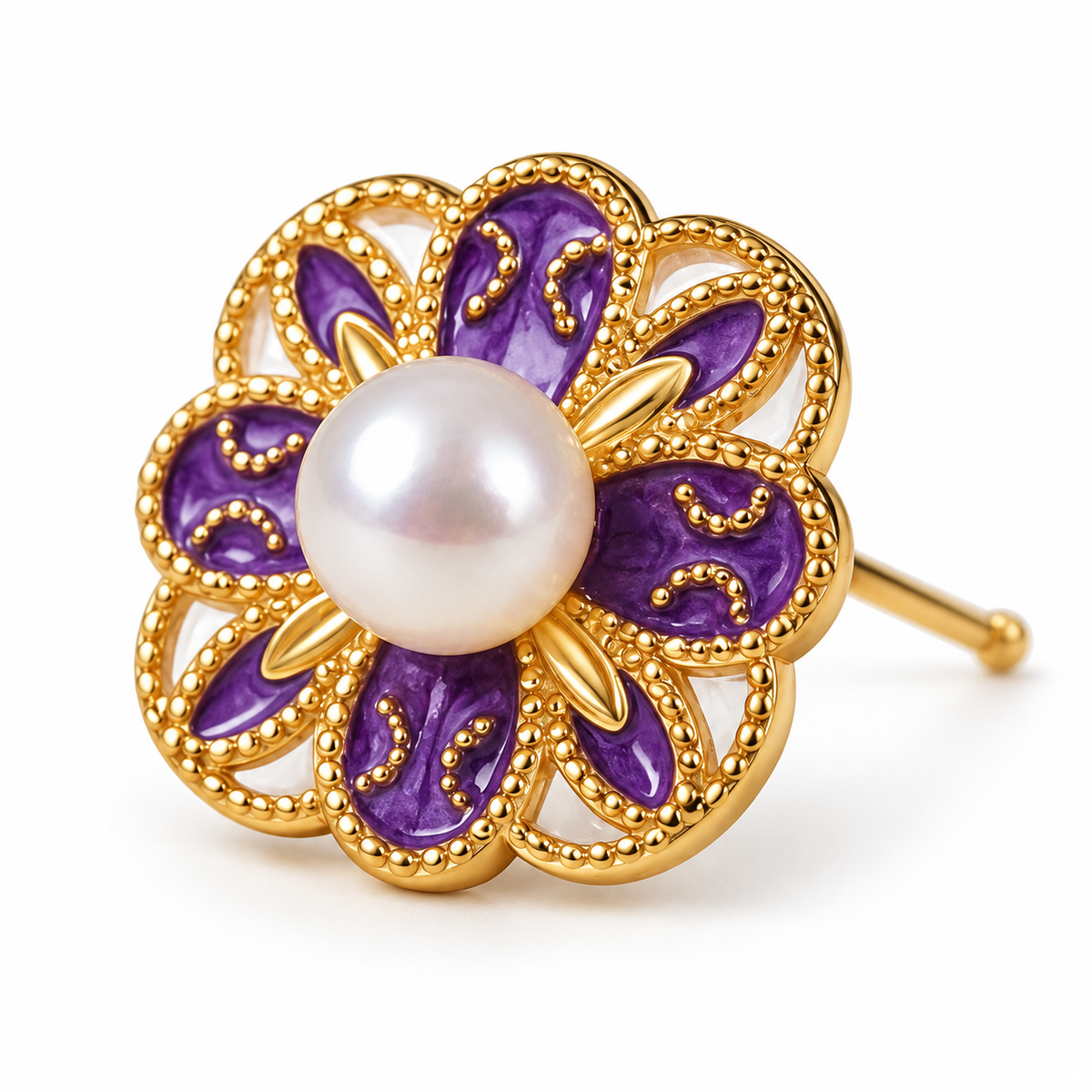 Macro view of the purple enamel flower ring with a freshwater pearl centre and gold beadwork