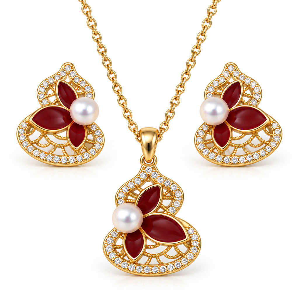 Gold lotus pearl necklace and earrings laid flat on white