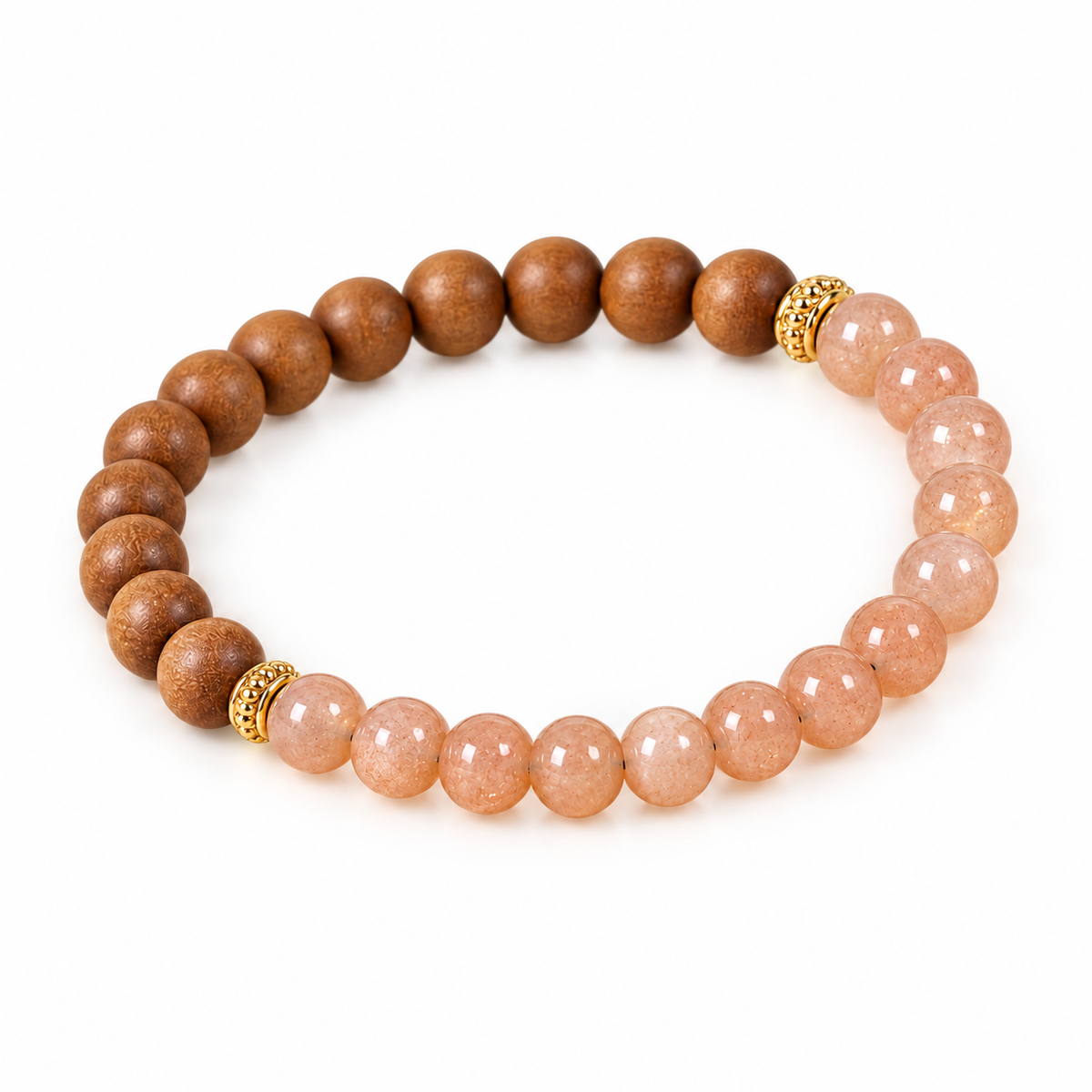Sunstone and sandalwood bracelet laid out to show the stone and wood halves