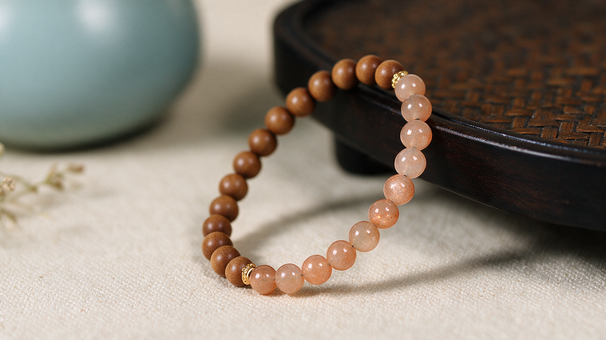 Peach sunstone and sandalwood bead bracelet, detail view 9