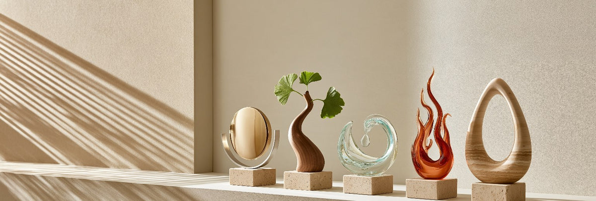 Five small sculptures for metal, wood, water, fire and earth