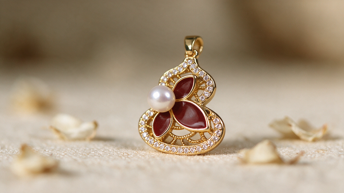 Close-up detail of pearl and enamel lotus pendant