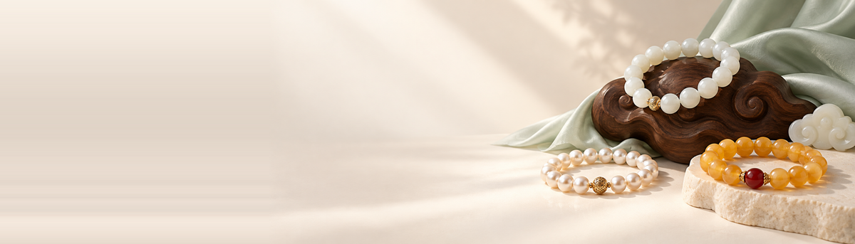 Meowyeah gemstone bracelets — white jade, freshwater pearl and beeswax amber on stone and silk